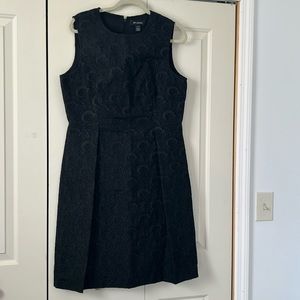 ST JOHN WOMEN DRESS SIZE 12  BLACK  WORN ONCE WITH TWO POCKETS